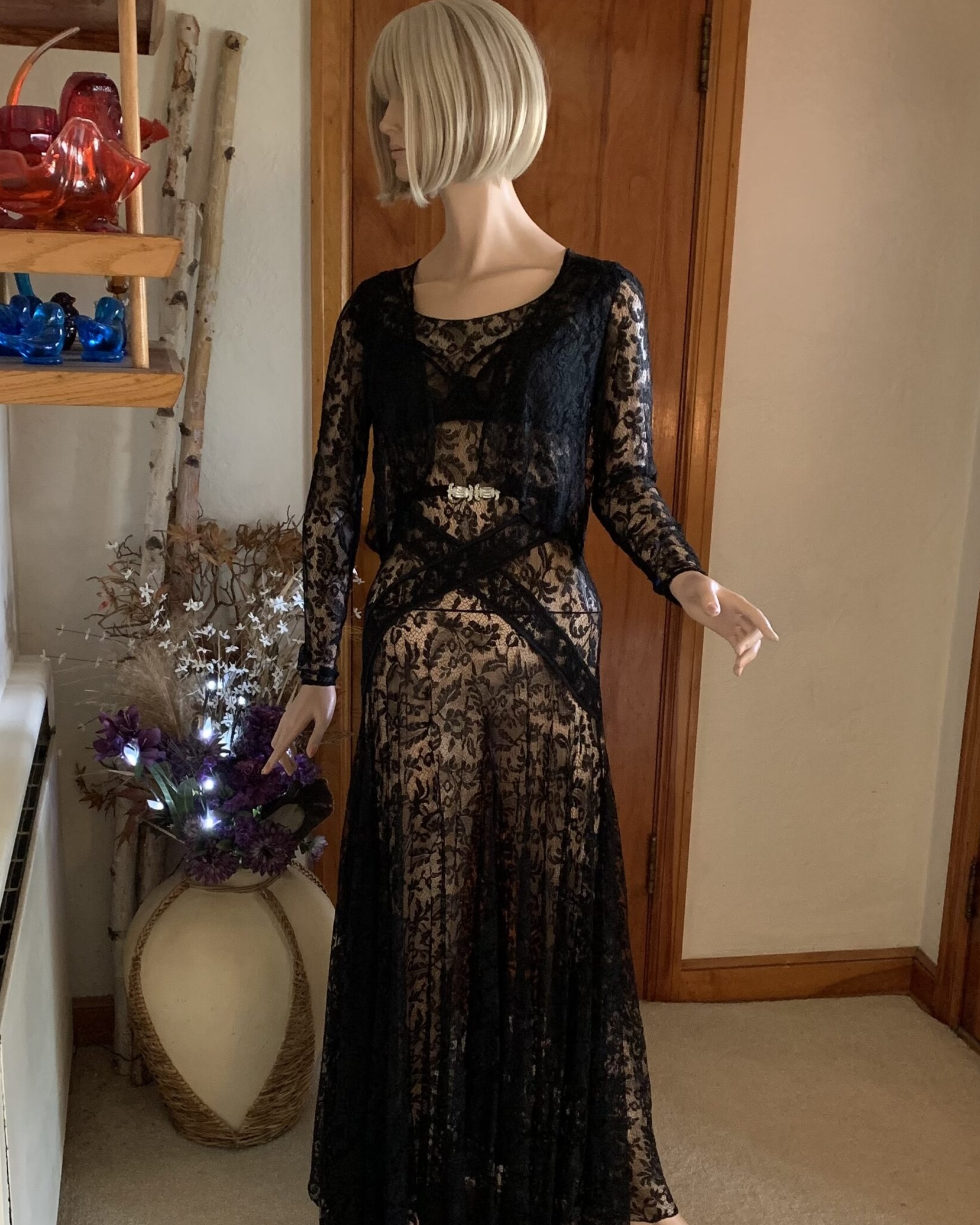 1930s black sheer lace evening gown set with matching cropped lace jacket displayed on mannequin against neutral backdrop