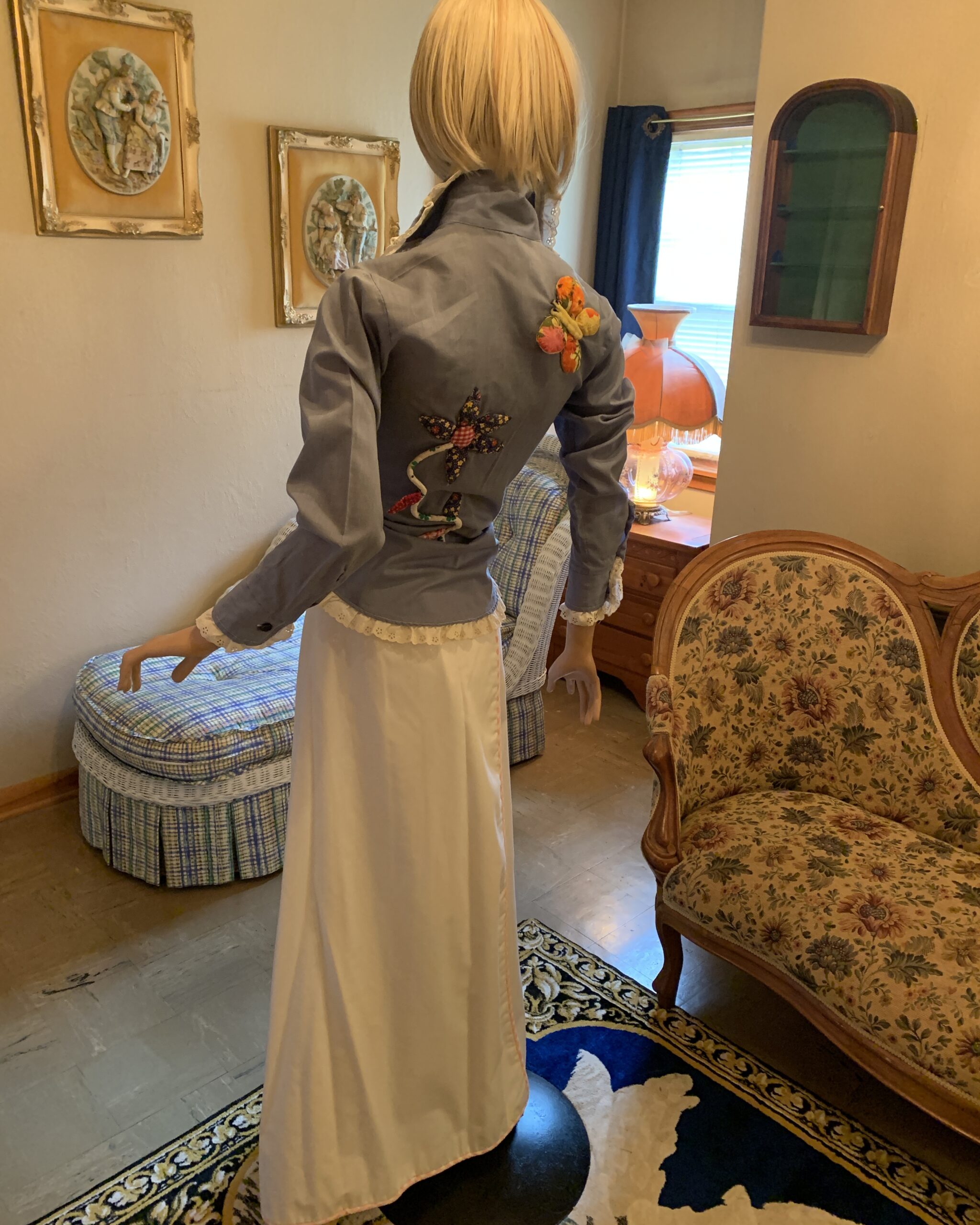 Back view of a vintage Catherine Carr white maxi skirt with a clean silhouette and smooth white fabric.