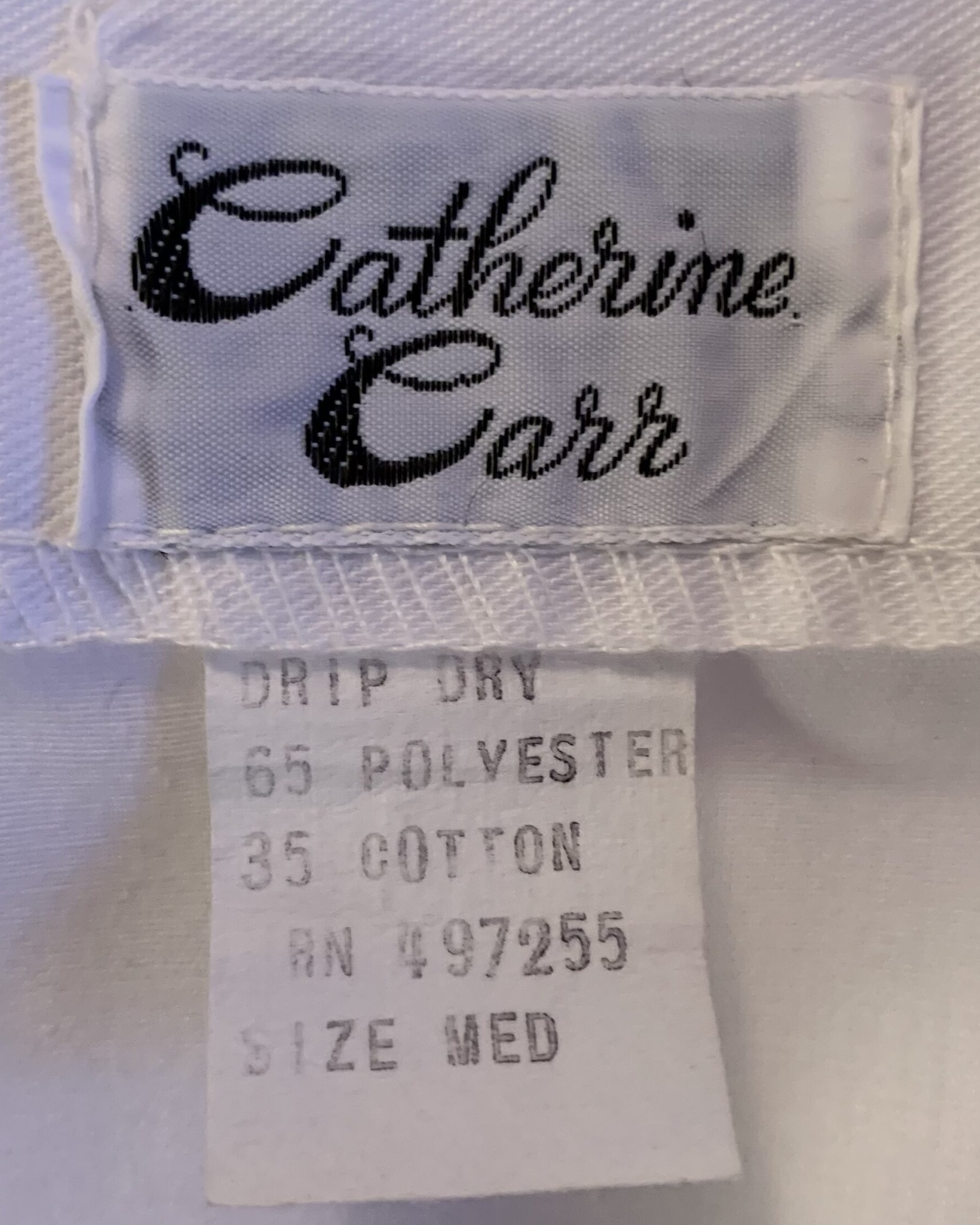 Original Catherine Carr label showing a size medium with a 65% polyester and 35% cotton fabric blend.