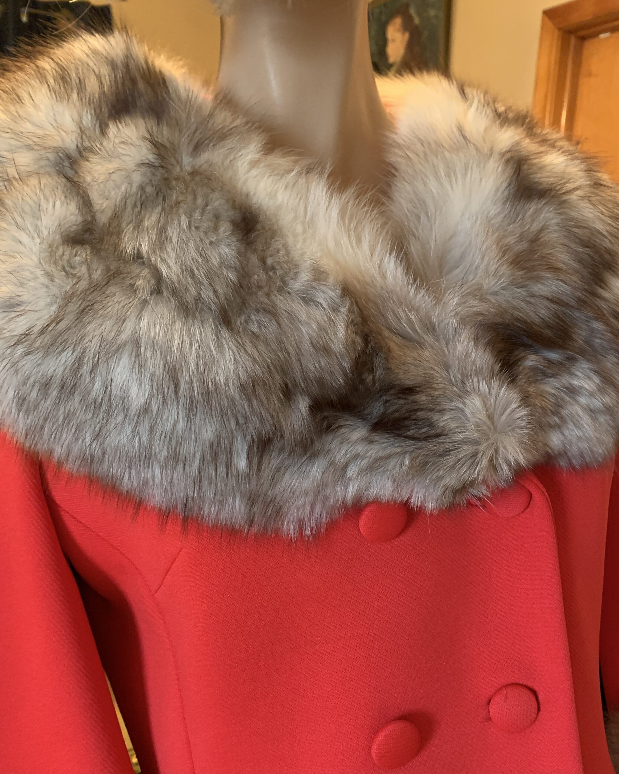 Close-up of genuine fox fur collar on a vintage Lilli Ann orange-red wool coat.