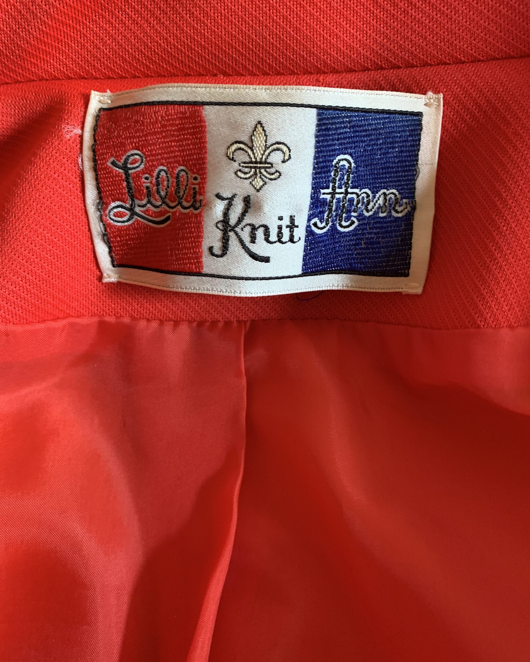 Original Lilli Ann label sewn into the interior of a vintage 1960s wool coat.