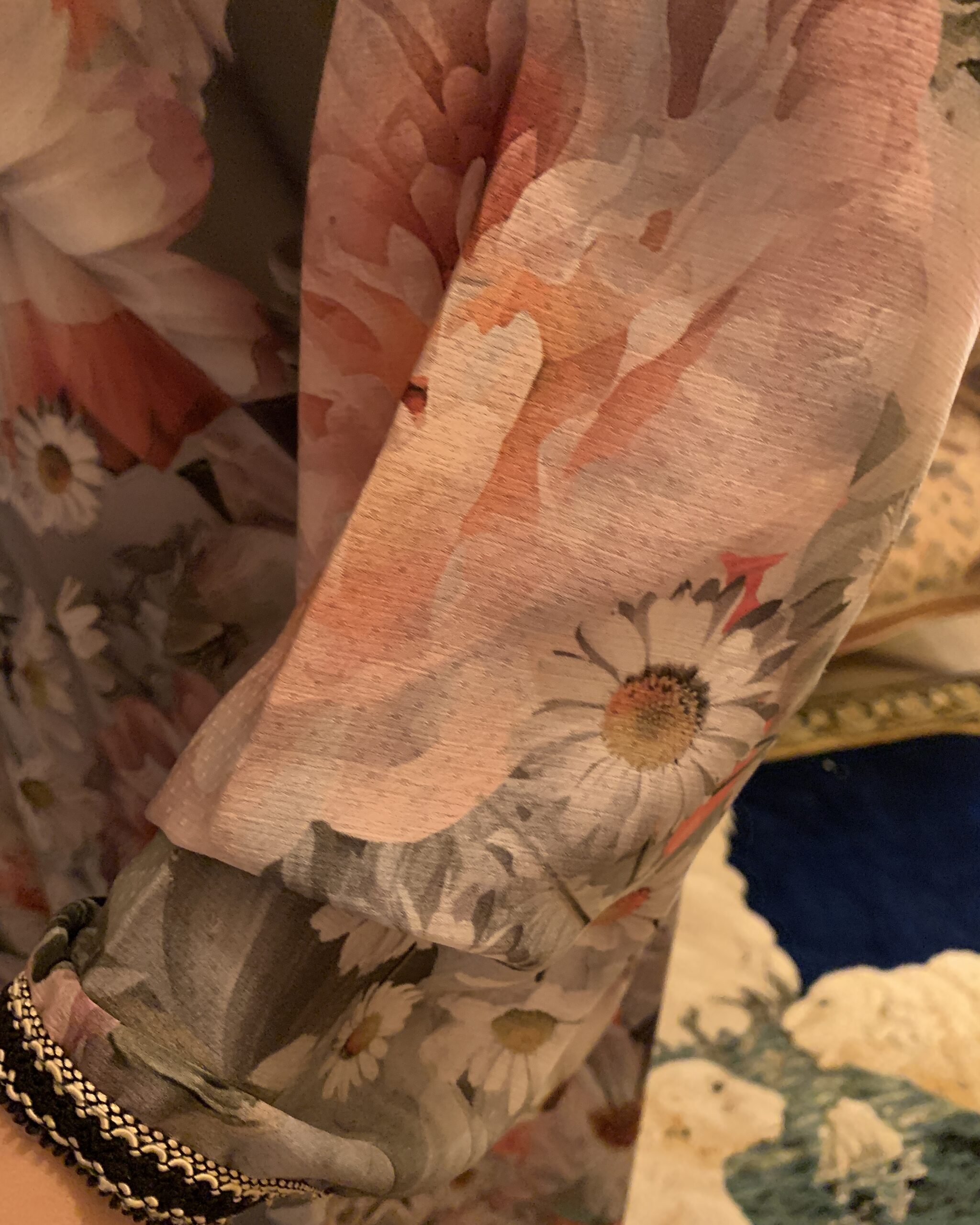 Close-up of the cuff and sleeve trim on a vintage floral butterfly sleeve maxi dress. 6. Fabric Close-Up