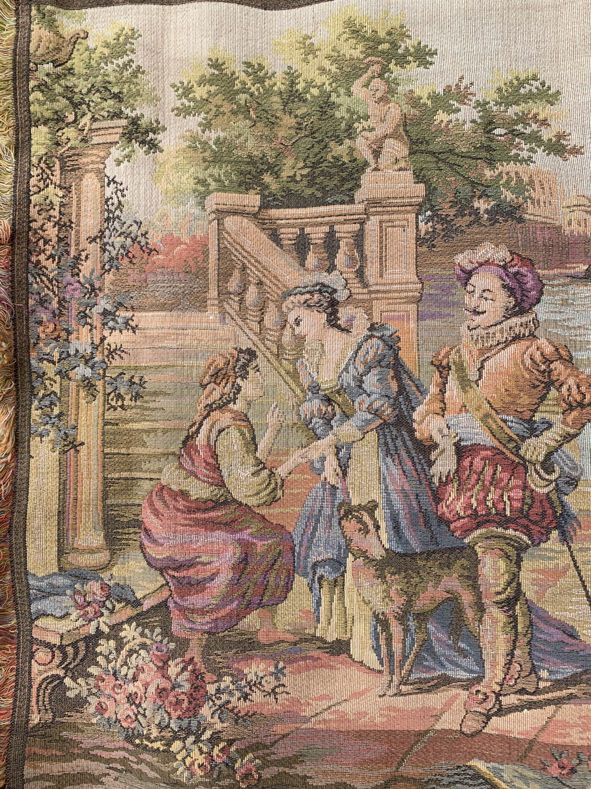 Detail of woven tapestry featuring garden staircase, flowering terrace, and Renaissance-inspired figures beside a Venetian canal.