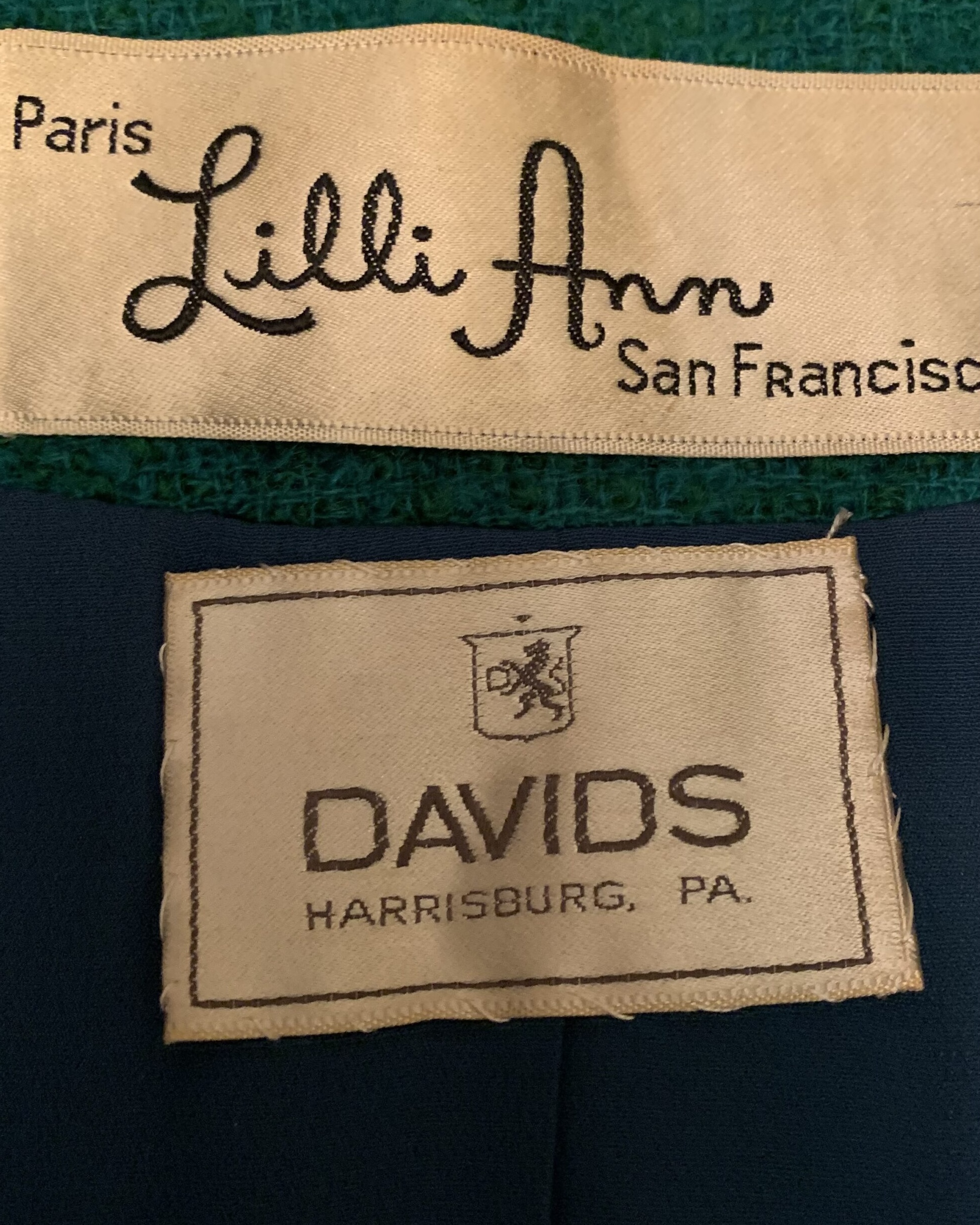 Original Lilli Ann San Francisco designer label and David’s Harrisburg retailer label sewn inside the vintage emerald green wool coat dress.