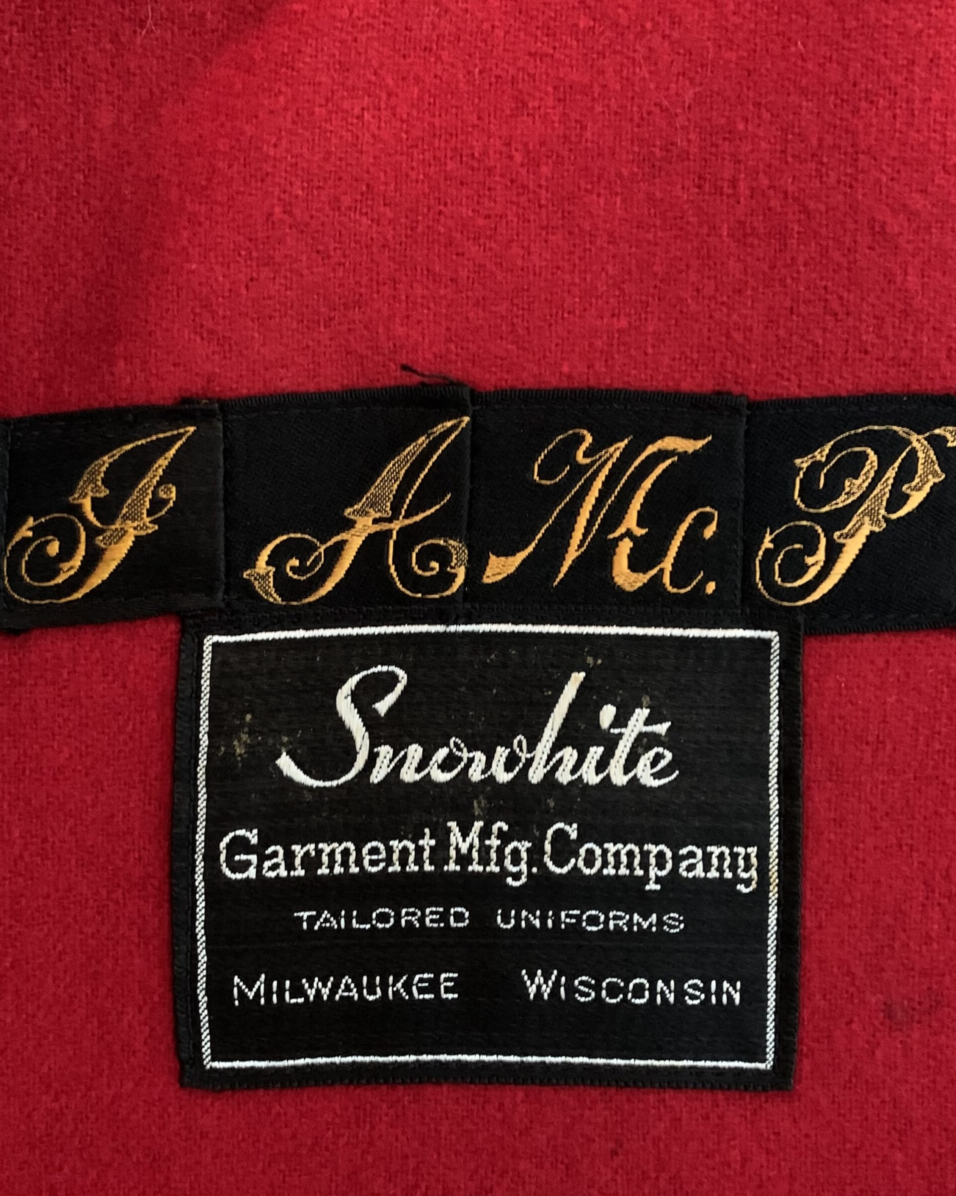 Original Snowhite Garment Manufacturing Company maker’s label inside a vintage nurse’s cape from Milwaukee, Wisconsin.