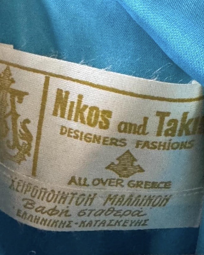 Vintage Nikos and Takis Designers Fashions label reading ‘All Over Greece’ inside 1970s Greek evening gown.