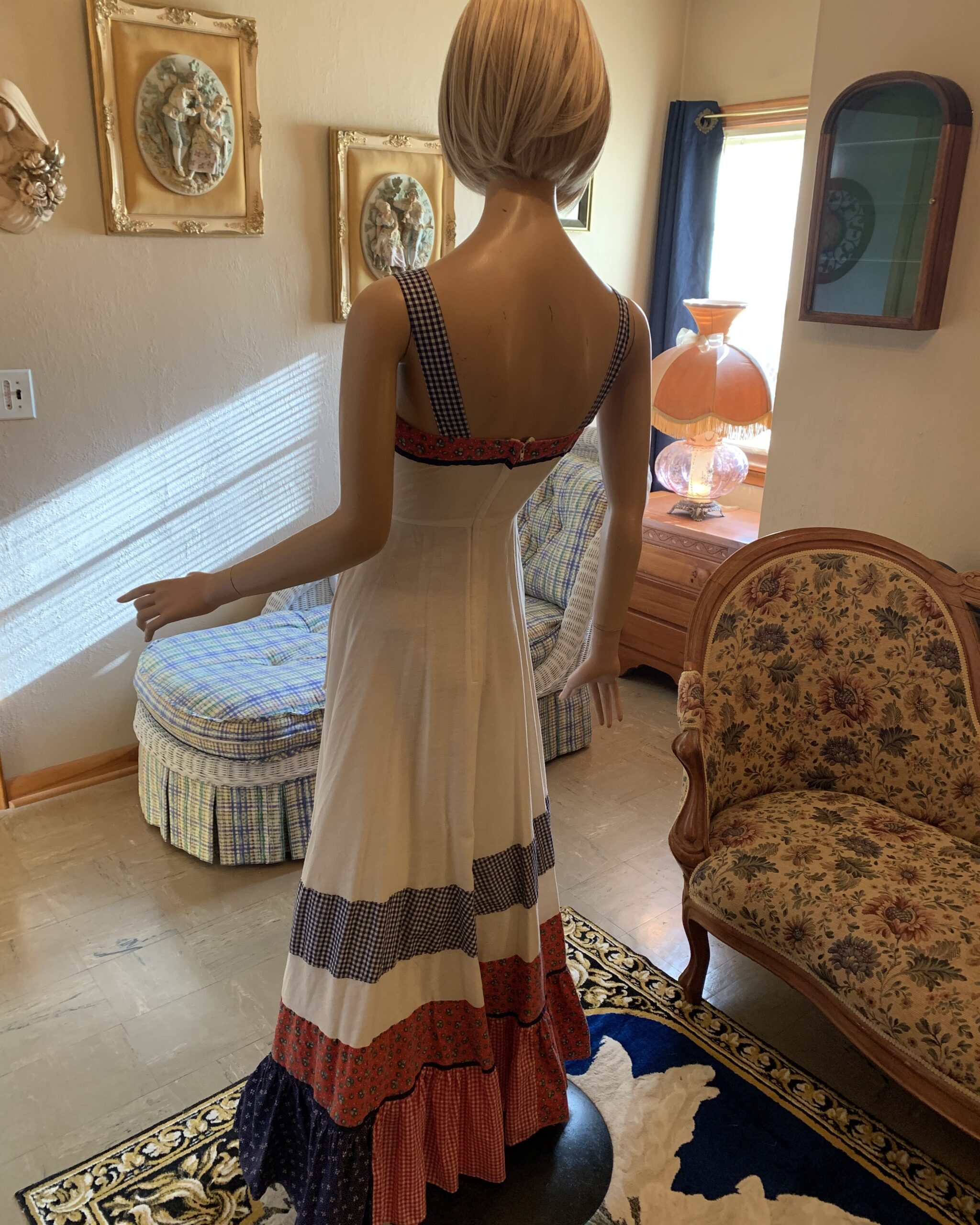Back view of Gold Label Gunne Sax prairie maxi dress showing fitted bodice, gingham straps, and full skirt.