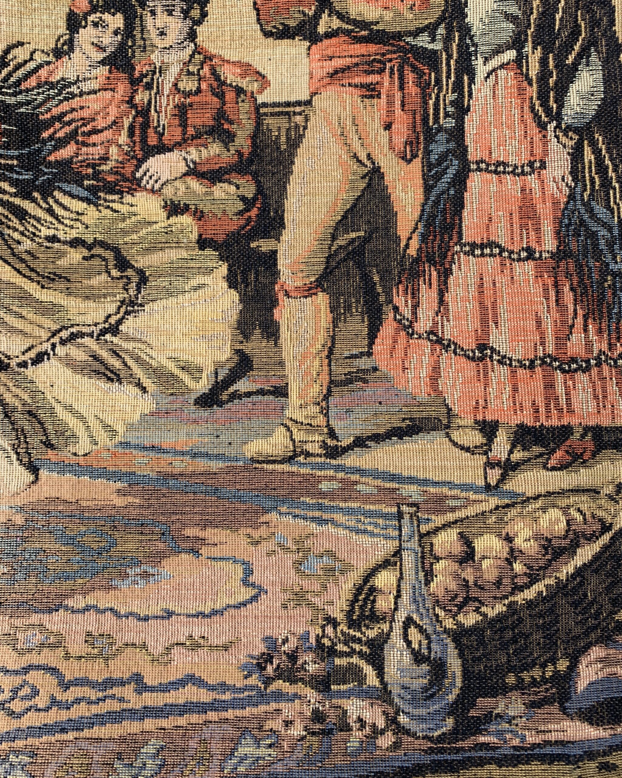 Spanish courtyard tapestry displayed outdoors on green lawn showing full narrative scene with dancers, horses, musicians, and architectural details.