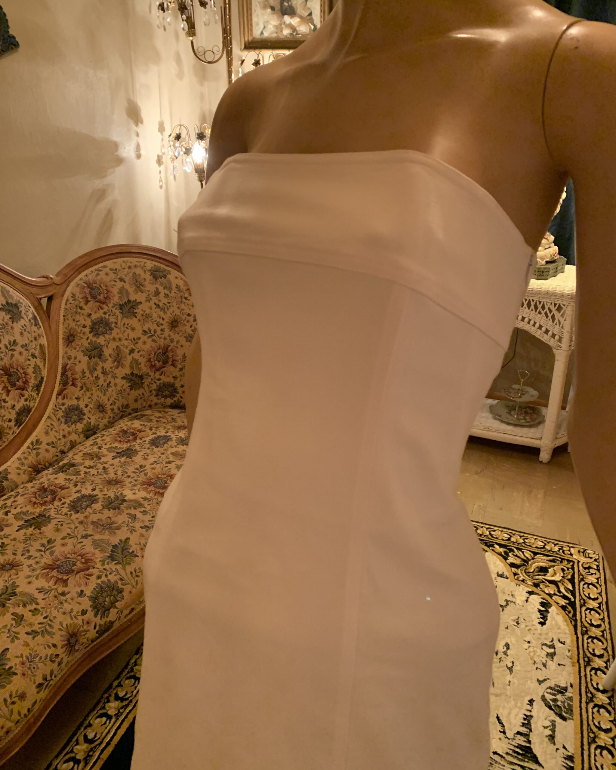 Close-up of the structured strapless bodice on a vintage Linda Segal Separates white dress.