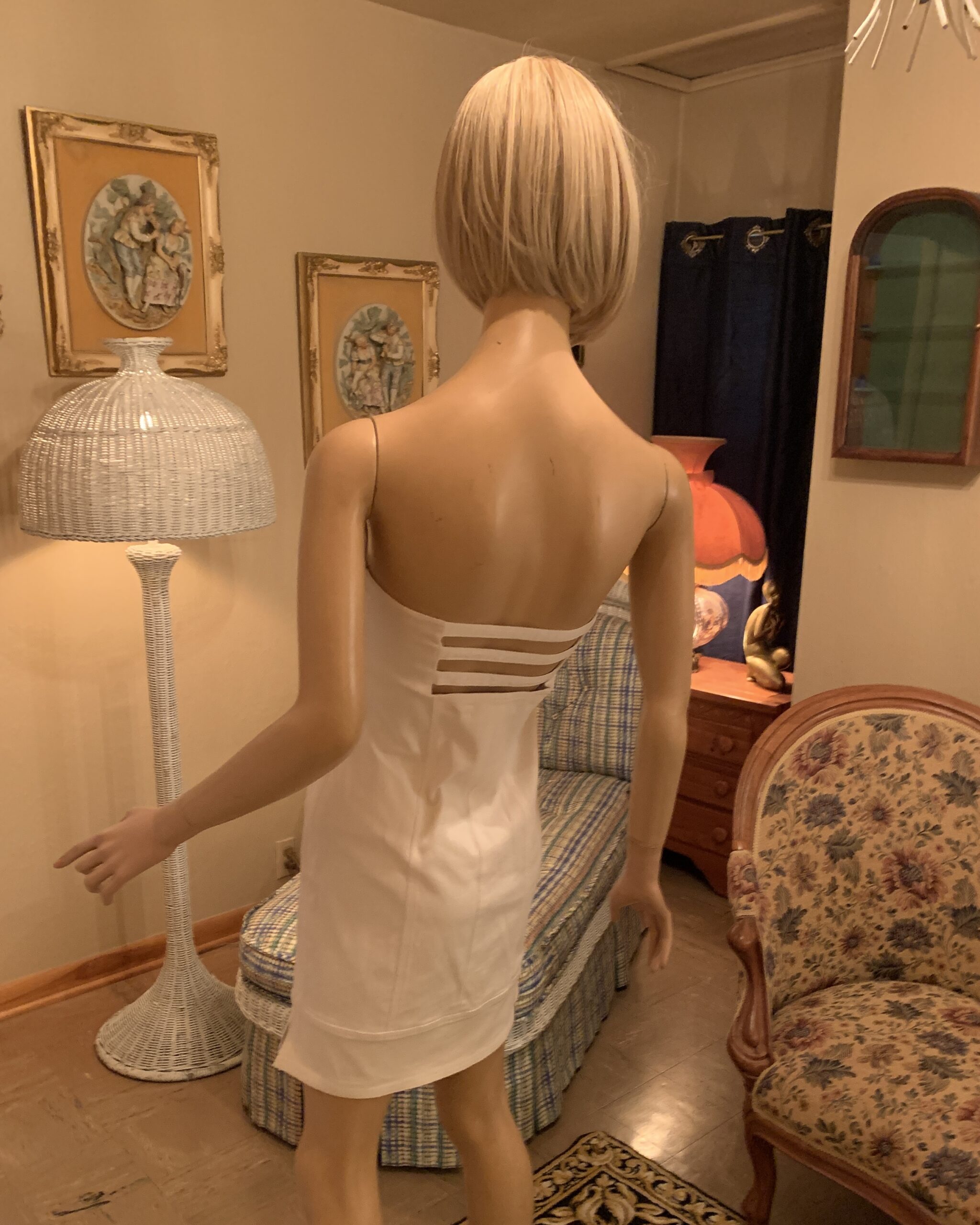 Back view of vintage Linda Segal Separates white strapless dress with horizontal open-back straps.
