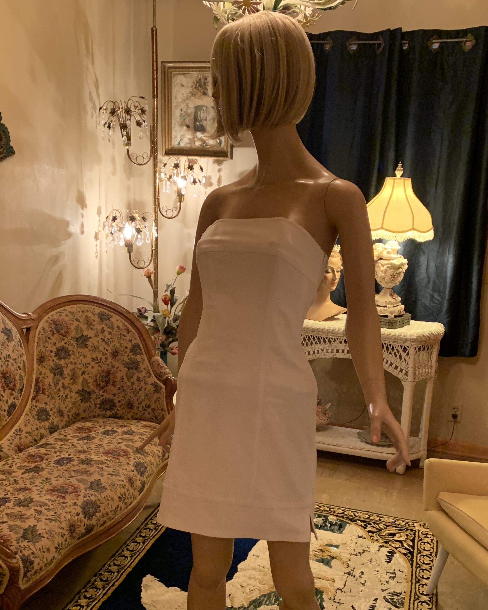 Vintage Linda Segal Separates white strapless cocktail dress with tailored fit on mannequin.