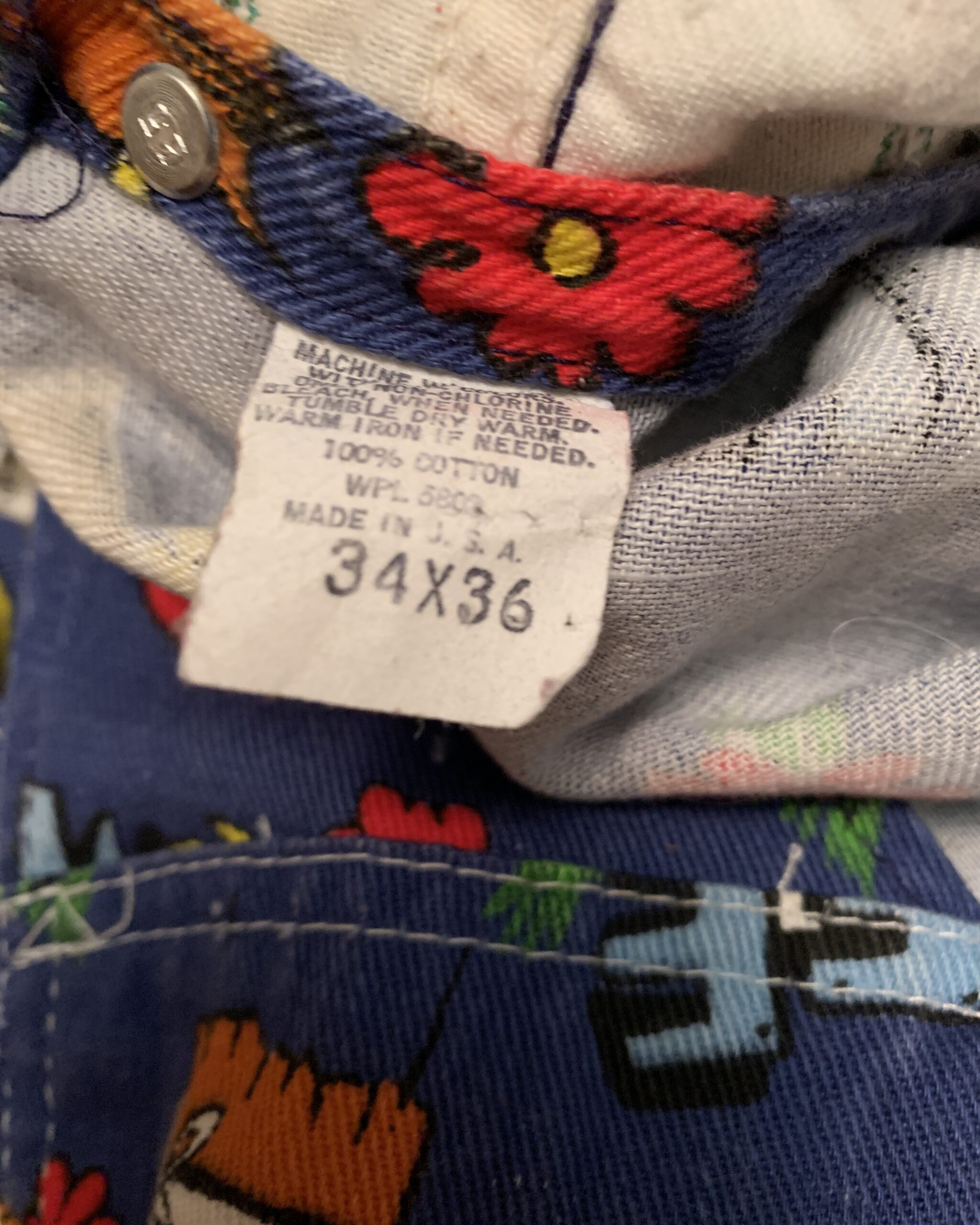 Original Liberty Overalls woven brand label inside vintage Hee Haw novelty print bib overalls.