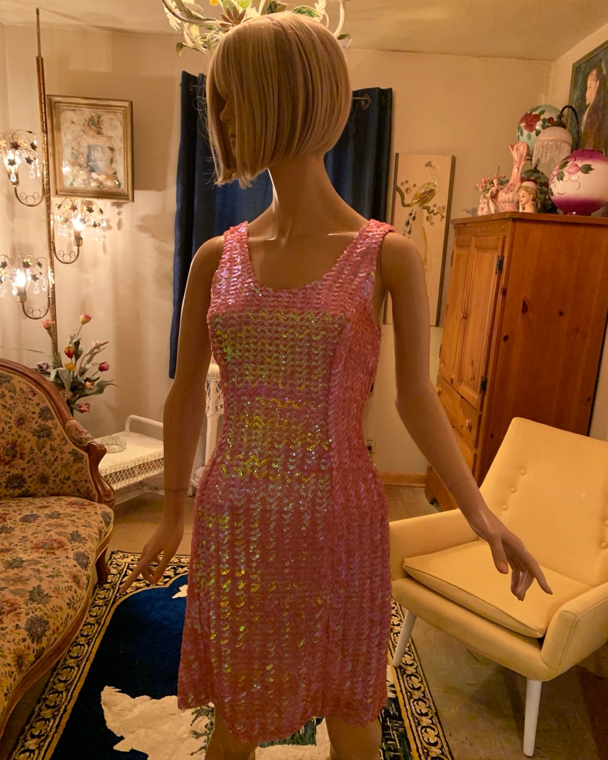 1960s pink iridescent sequin cocktail dress shown on mannequin