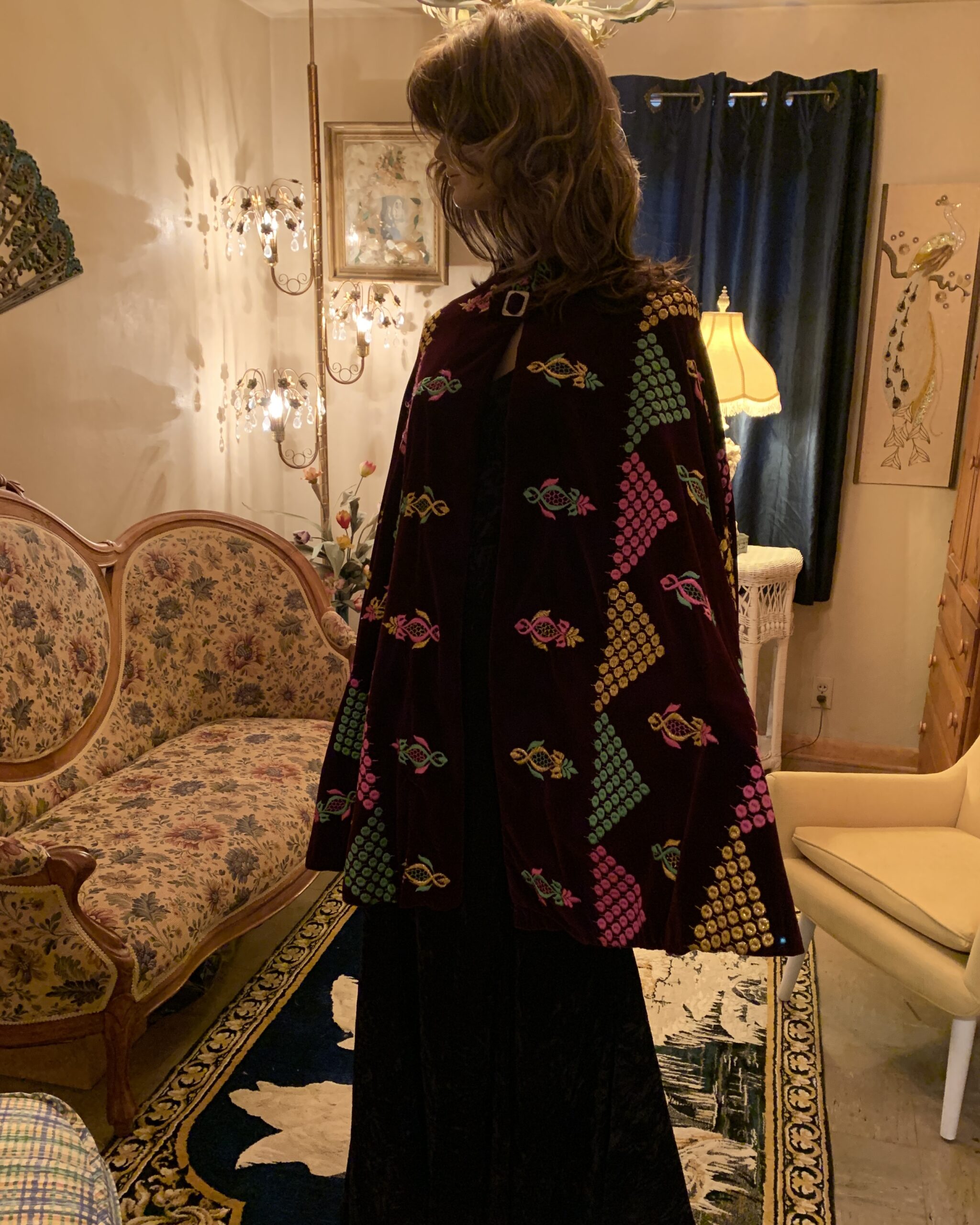 Vintage wine velvet cape with pink, green and gold jewel-tone embroidery, full front view.
