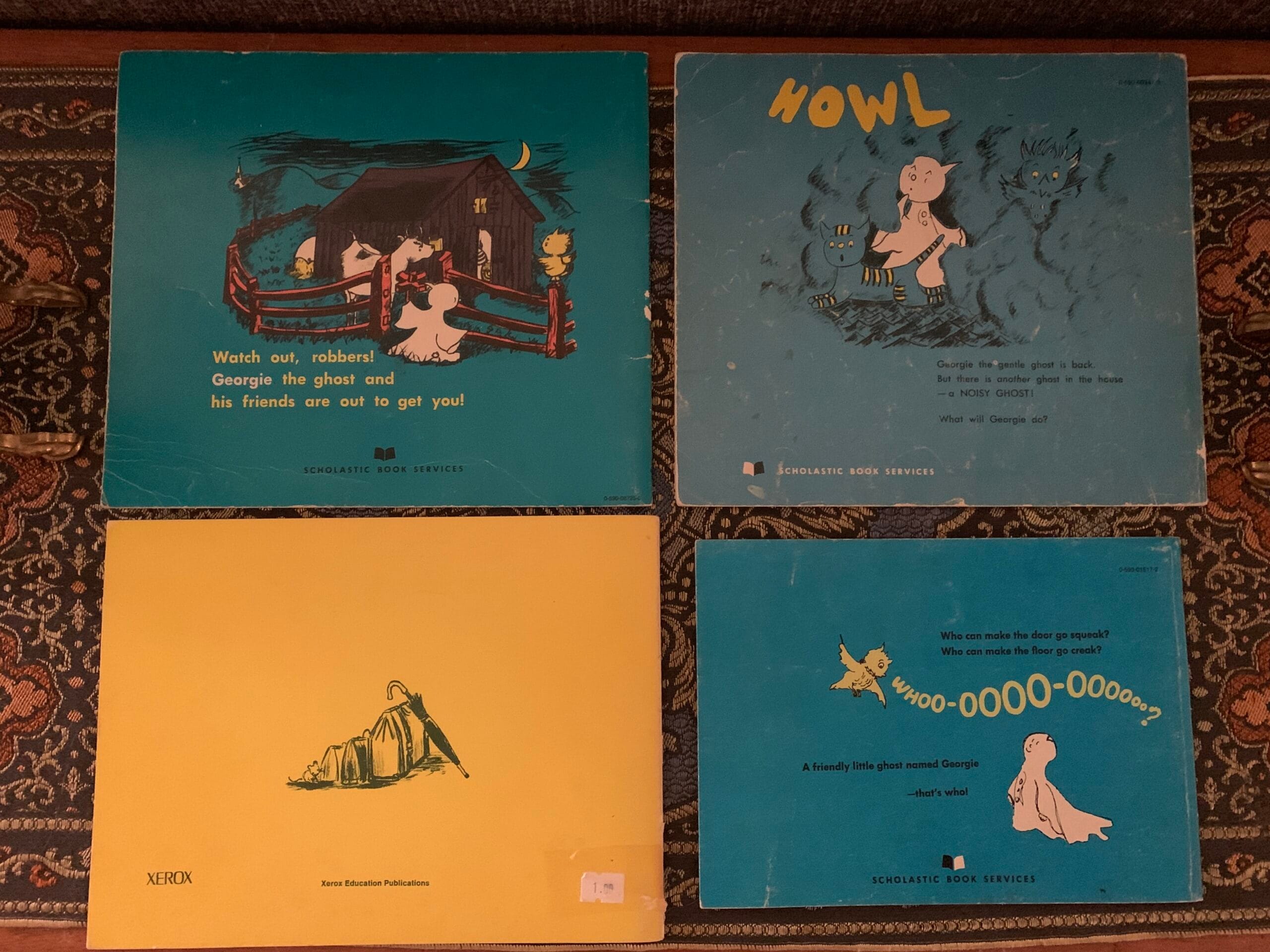Back covers of four vintage Georgie the Ghost books by Robert Bright showing Scholastic and Xerox publication details.